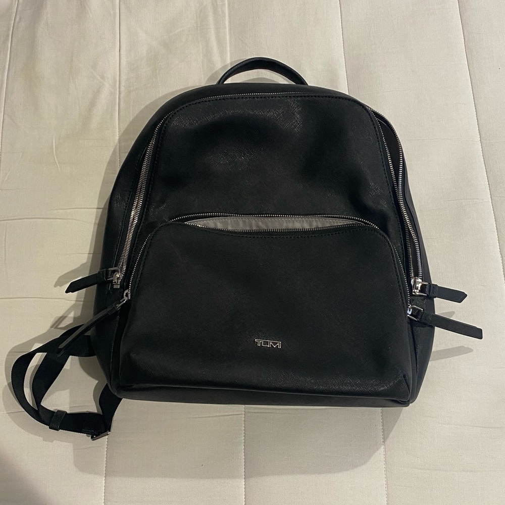 Tumi leather backpack with silver hardware